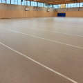 Verlegung, Abkleben, Hallenboden-Schutzbelag, Hallenboden-Schutzbeläge, Transport, Belagrollis, Belagkanten, Klebeband, Abrollgerät